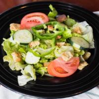 House Garden Salad · Green peppers, tomatoes, cucumbers and croutons.