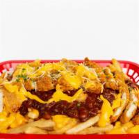 Chili Cheese Fries · Crispy Seasoned fries topped with our thick and hearty beef chili and Monterey cheddar chees...