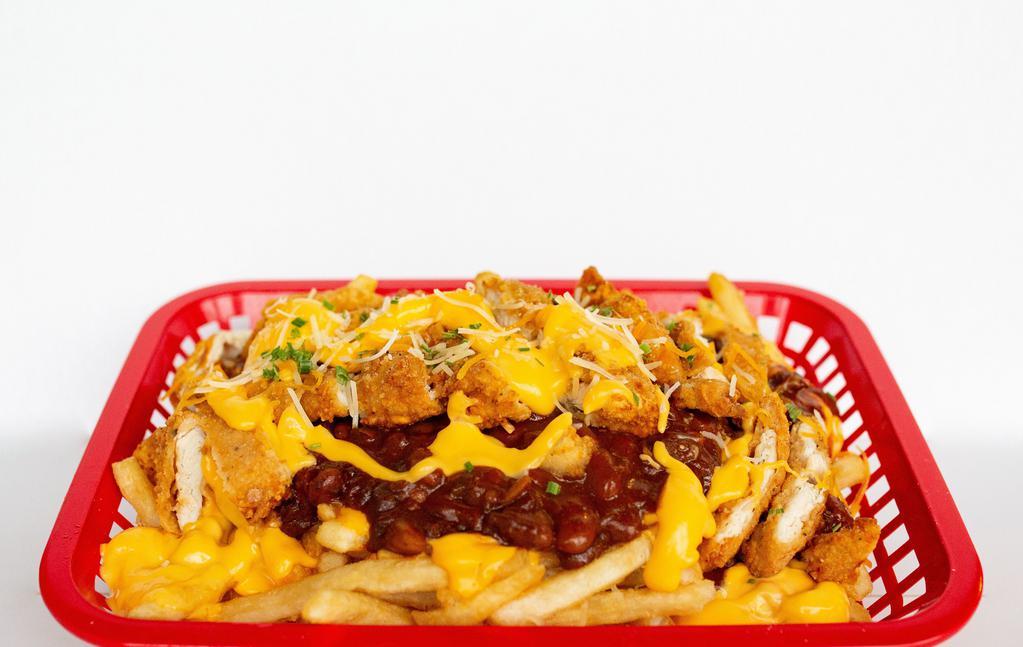 Chili Cheese Fries · Crispy Seasoned fries topped with our thick and hearty beef chili and Monterey cheddar cheese topped with our crispy chicken.