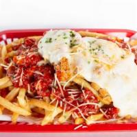 Pizza Fries · Crispy Seasoned fries topped with our signature garlic basil marinara sauce then toasted wit...