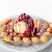 The Shortcake · VANILLA ICE CREAM AND FRESH STRAWBERRIES ON A CRISPY WAFFLE WITH POWDERED SUGAR AND ICING