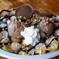 The Reeces · HOT & CRISPY WAFFLE , CHOCOLATE ICE CREAM , CRUSHED PEANUTS, REECES PIECES,  CHOCOLATE DRIZZ...