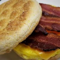 Bacon, Egg & Cheese Breakfast Sandwich · Thick cut applewood smoked bacon, scrambled egg and American Cheese