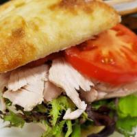 Roasted Turkey Sandwich · Brined, roasted and thinly sliced local Ferndale Market turkey breast with your choice of br...
