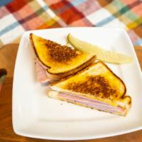 Grilled Ham & Cheese · Ham off the bone with melted swiss cheese.