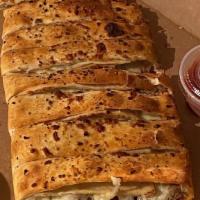 Deluxe Buckeye Stromboli · Pepperoni, Sausage, Ham, Onion, Green Peppers & Extra Cheese