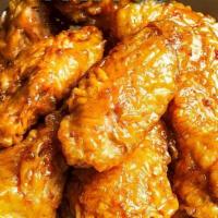 Soy Garlic Wings · A savory soy based sauce with a mild tang of garlic.