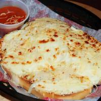 Garlic Bread With Cheese · Bread brushed with a Herbed Garlic Butter, broiled to perfection and served with Housemade M...