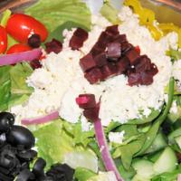 Greek Salad Family · Same as our Garden Salad topped with Feta Cheese and Beets.