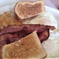 Working Man · Two eggs, hash browns, choice of ham, bacon or sausage, toast and jelly.