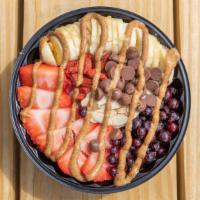 Vikings Bowl · Organic açaí­ blend with strawberries, blueberries, and banana. Toppings: organic granola, b...