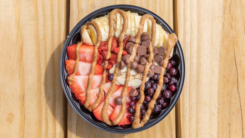Vikings Bowl · Organic açaí­ blend with strawberries, blueberries, and banana. Toppings: organic granola, bananas, strawberries, chocolate chips (no sugar added), almonds, goji berries and peanut/almond butter.
