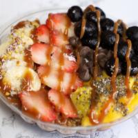 Hawaiian Bowl  · Organic açaí­ blend with banana and strawberries. 
Toppings: organic granola, mango, strawbe...