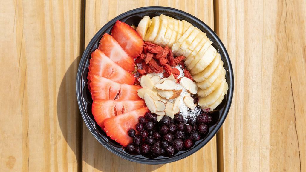 Vegan Bowl  · Organic açaí­ blend with banana and strawberries. 
Toppings: vegan granola, strawberries, blueberries, banana, almonds, shredded coconut and goji berries.