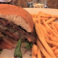 Juicy Lucy · Half pound burger stuffed with bacon and Cheddar cheese prepared medium.