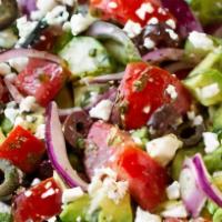 Greek Salad · Salad greens, feta cheese, beets, pepperoncini, red onion, Kalamata olives, and tomato.