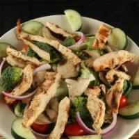 Grilled Chicken Salad · Salad greens, broccoli, mushrooms, red onion, cucumber, tomato, and grilled chicken breast.