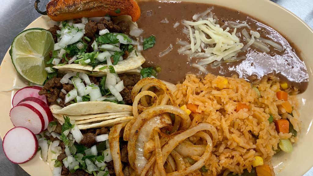 Soft Taco Lunch Special · Three street tacos served with rice and beans.
