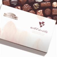 Valentine'S Day Chocolate Gift Boxes · Assorted Chocolates boxes with sophisticated seasonal sleeves along with a specialty Valenti...