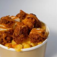 Mac-Moody · Creamy mac n' cheese, crispy chicken & bushki sauce.