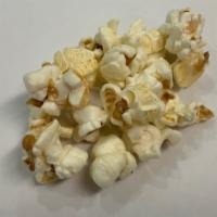 White Cheddar · White cheddar cheese is tumbled with our white popcorn for a delicious snack.