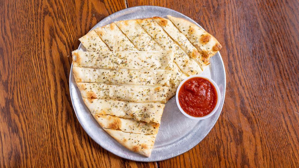Italian Fries With Cheese · Our flaky thin pizza crust folded in half and filled with mozzarella cheese, topped with garlic butter and our special spices. Served with dipping sauce.