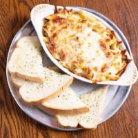Baked Spaghetti Or Baked Penne · Smothered in homemade spaghetti sauce and topped with mozzarella cheese and baked in a pan. ...