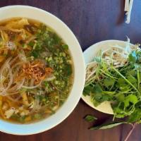 Pho Chicken Noodle Soup (Pho Ga) · Shredded chicken breast in beef bone based pho broth. Pho noodles, bean sprouts, cilantro, b...