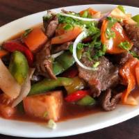 Hoisin Beef · Round-eye peppered steak stir-fried with vegetables  (zucchini, carrots, tomatoes, bell pepp...