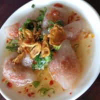 Banh Bot Loc (6) · Vietnamese handmade pork and shrimp dumplings garnished with fried onions and green onions s...
