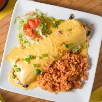Lunch P.V.B. · Beef, pork, and black bean burrito smothered in queso. Served with rice only.