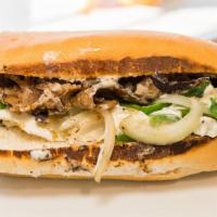 Philly Cheesesteak · Thinly sliced steak, grilled onions, and mixed peppers, provolone cheese, house mayonnaise o...