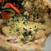 Lemon Sole · fillet of sole baked with fresh herbs and a touch of bread crumbs then topped with a lemon, ...