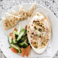 Stuffed Flounder · Flounder stuffed with mixed seafood then baked in light creamy cheese sauce. Served with ric...