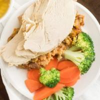 Roast Turkey · In house oven roasted turkey served with stuffing and giblet gravy.