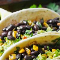 Black Bean & Corn Pico Taco'S (4) · Black beans, corn, pico served with your meat of choice & Lime Crema.   Served with Cheesy T...