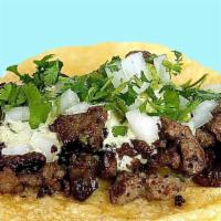 Tacos Asada · The most popular taco. Tender carne asada, grilled onions, charred poblano crema, fresh toma...