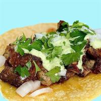 Taco Pollo Asado · Tijuana style. Char grilled chicken, creamy guacamole sauce, charred tomate salsa ranchera. ...
