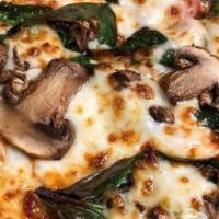 Alfredo Pizza · Chicken, baby spinach, mushroom, fresh garlic, alfredo sauce and mozzarella cheese.