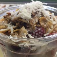 Bionico · Fruit cup with sweet cream, granola, pecan and coconut