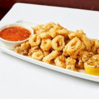 Calamari · Lightly hand-breaded, served with sweet chili sauce