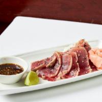 Sesame Seared Sashimi Tuna · #1 grade ahi tuna, served with traditional accoutrements