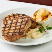 Pork Chops · Cherrywood smoked, locally sourced from Smoking Goose, served with redskin mashed potatoes.