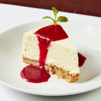 Housemade Cheesecake · New York style, graham cracker crust, raspberry puree.