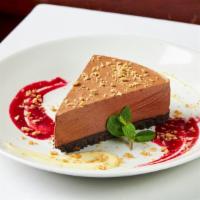 Double Chocolate Mousse Pie · Chef Jeremy’s double chocolate mousse pie with raspberry purée, espresso cream anglaise and ...