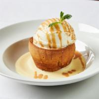 Bourbon Butter Cake · House-made bourbon butter cake with crème anglaise and caramel sauce.  Ice cream optional.