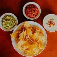 Chips & Dips · house made tortilla chips with fresh salsa, fresh guacamole and queso cheese sauce