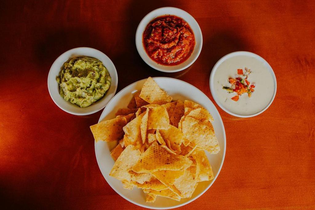 Chips & Dips · house made tortilla chips with fresh salsa, fresh guacamole and queso cheese sauce