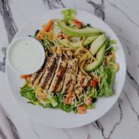 Southwest Chicken Salad · marinated grilled chicken, chopped romaine, sliced avocado, cheddar jack cheese, corn, black...