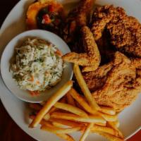 4 Pc Fried Chicken · hand breaded, broasted 1/2 bird, served with sweet corn cake, cole slaw and choice of one si...